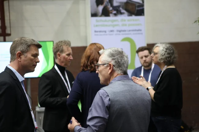 Networking und Fachgespräche am BMC Education Stand beim Zukunftstag Mittelstand 2026 in Berlin